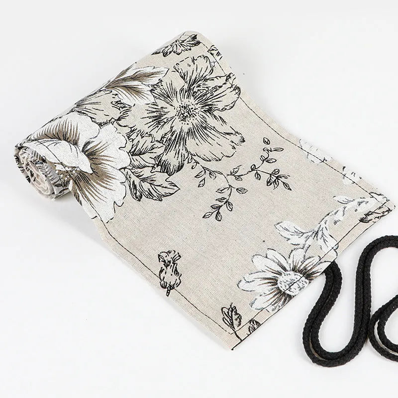 Black Peony printed canvas pencil roll bag unrolled showing 24 holes or 72 holes.