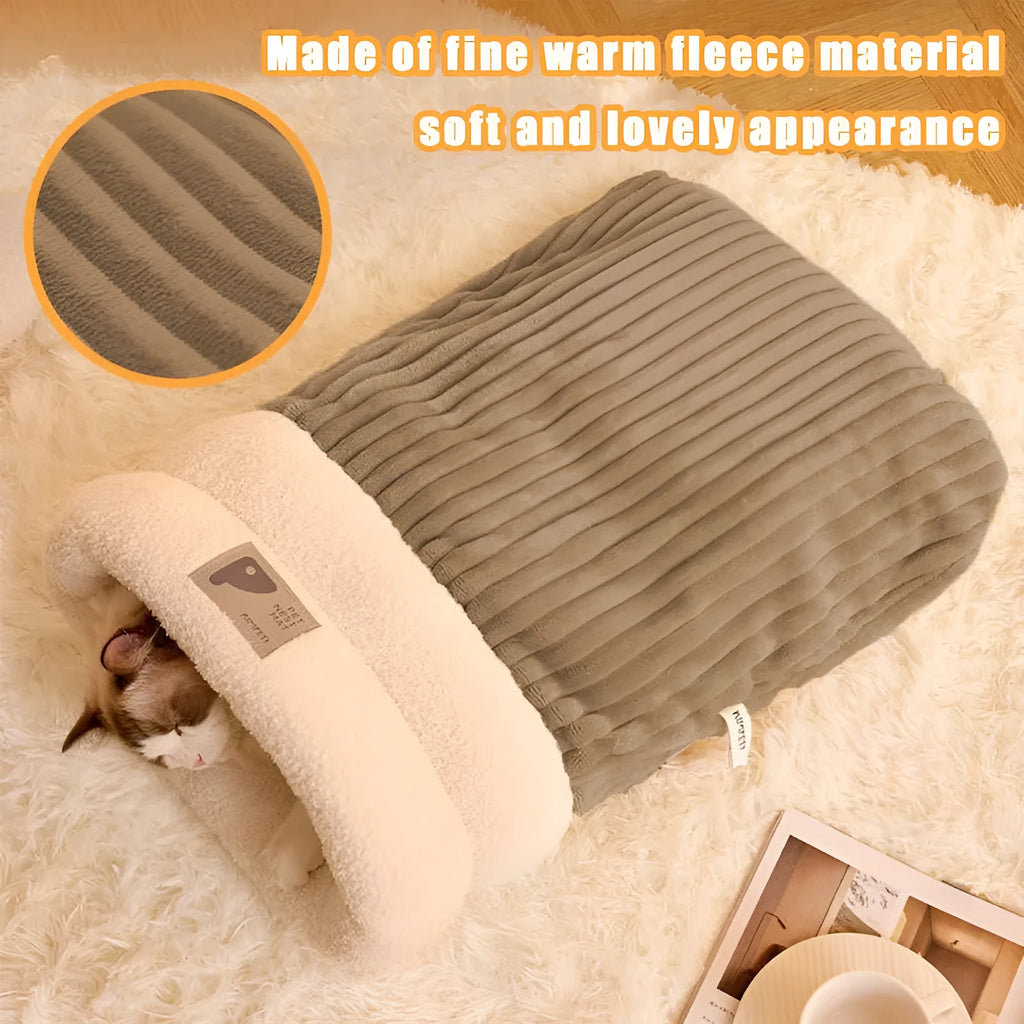 Brown plush semi-enclosed cat sleeping bag with thick stripes, shown on a floor.