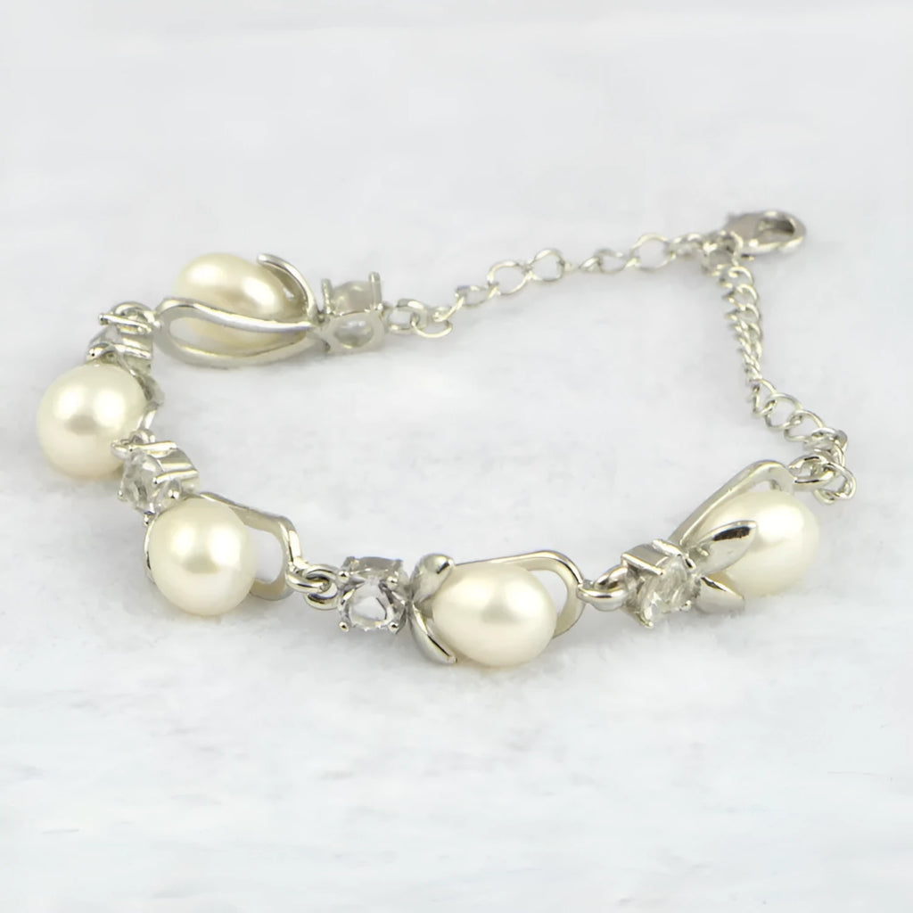 Freshwater pearl bracelet with Korean crown design alloy closure on display