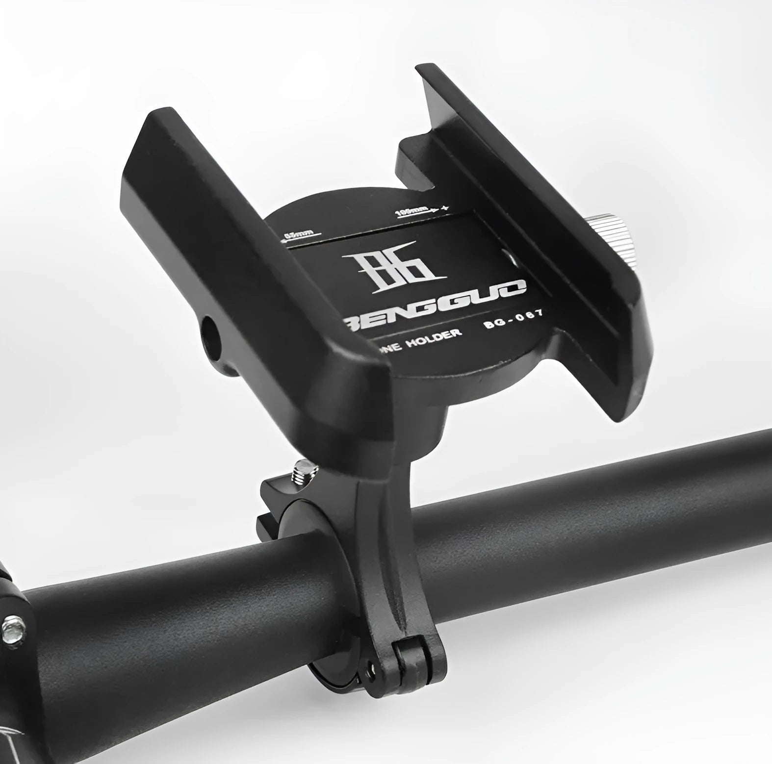 Black aluminium alloy bicycle phone holder mounted on a handlebar with a mobile phone secured inside.