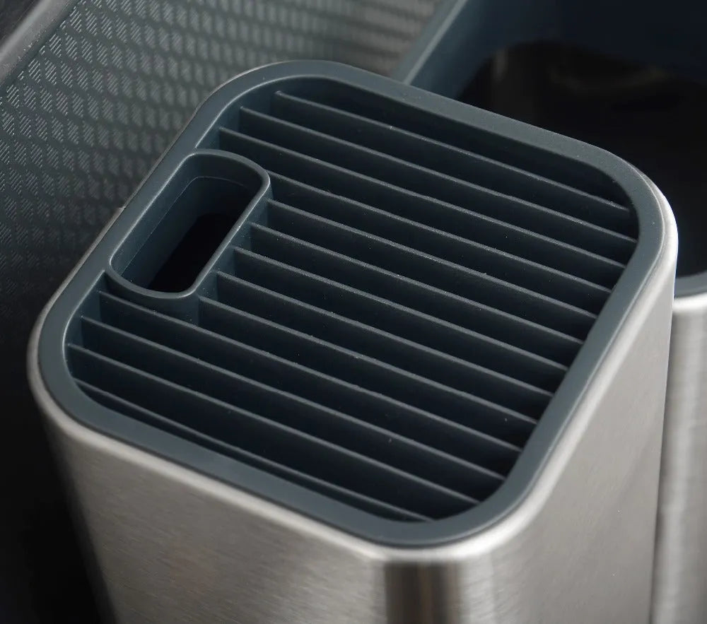 Black kitchen knife holder with detachable storage bucket showing stainless steel blade slots
