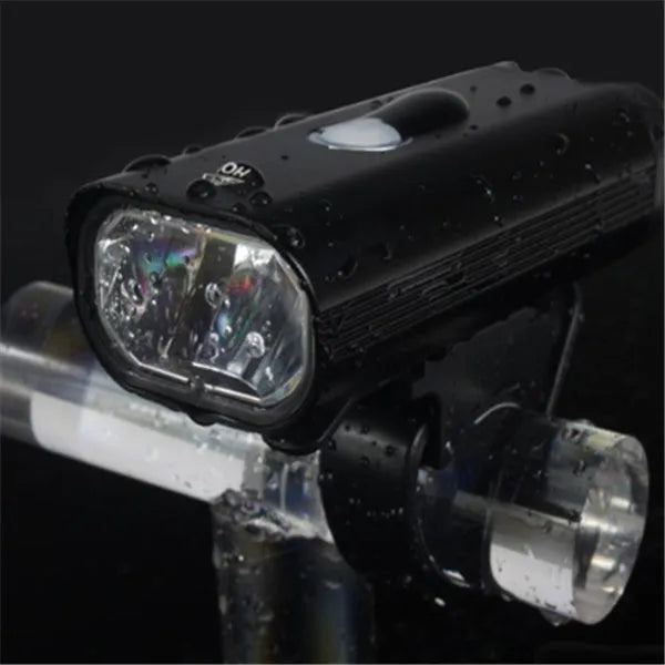 Black bicycle light with over-discharge protection for night cycling on a bike handlebar