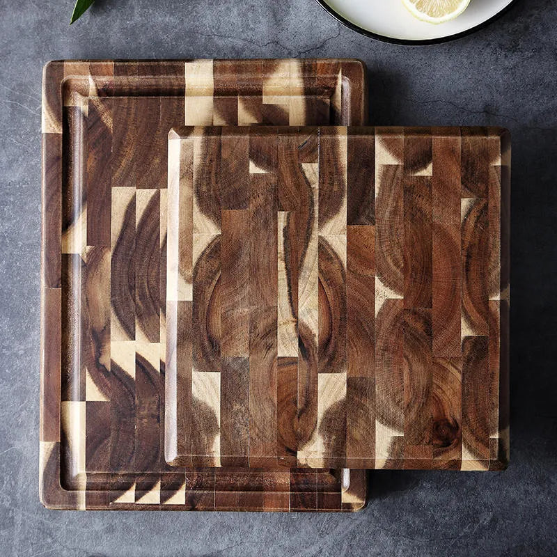 Brown solid wood cutting board with parquet pattern, 3cm thick, on kitchen counter