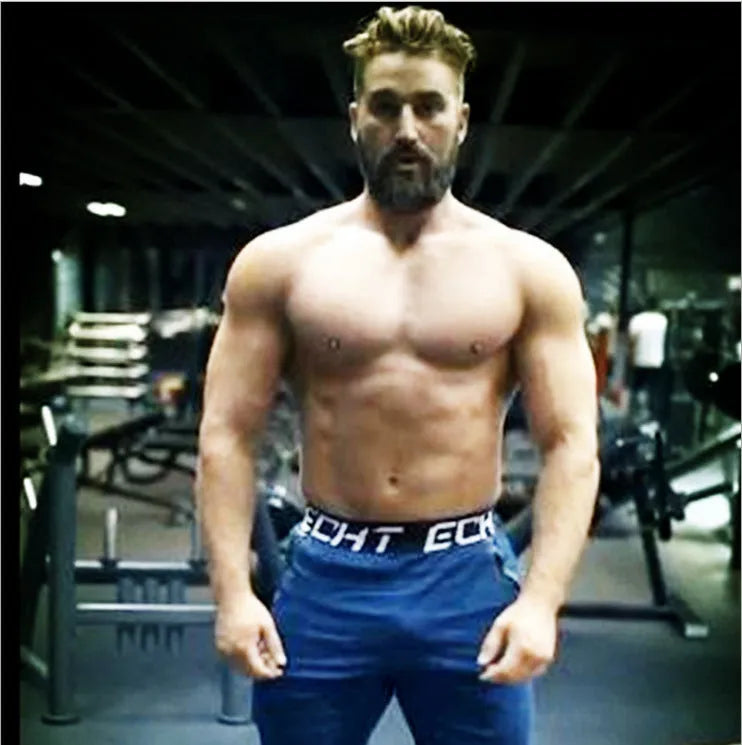 Men's cotton fitness sweatpants in black, grey, and navy blue for running and gym