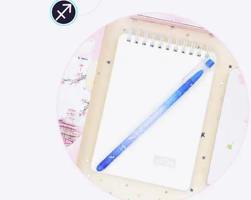 Boxed set of 12 constellation-themed quick-drying gel pens with plastic barrels.