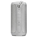 Waterproof outdoor portable Bluetooth speaker in black, camouflage, grey, or red colour options.
