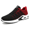 Men's low-top Flyknit mesh sneaker in black and grey colour with lace-up front and soft sole.