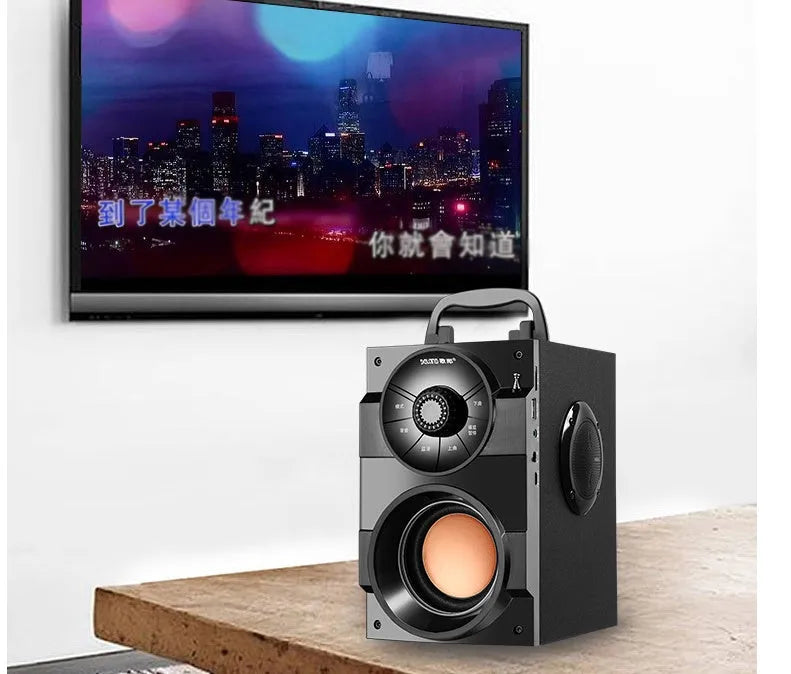 Black mini portable home audio speaker system with subwoofer and connection cable