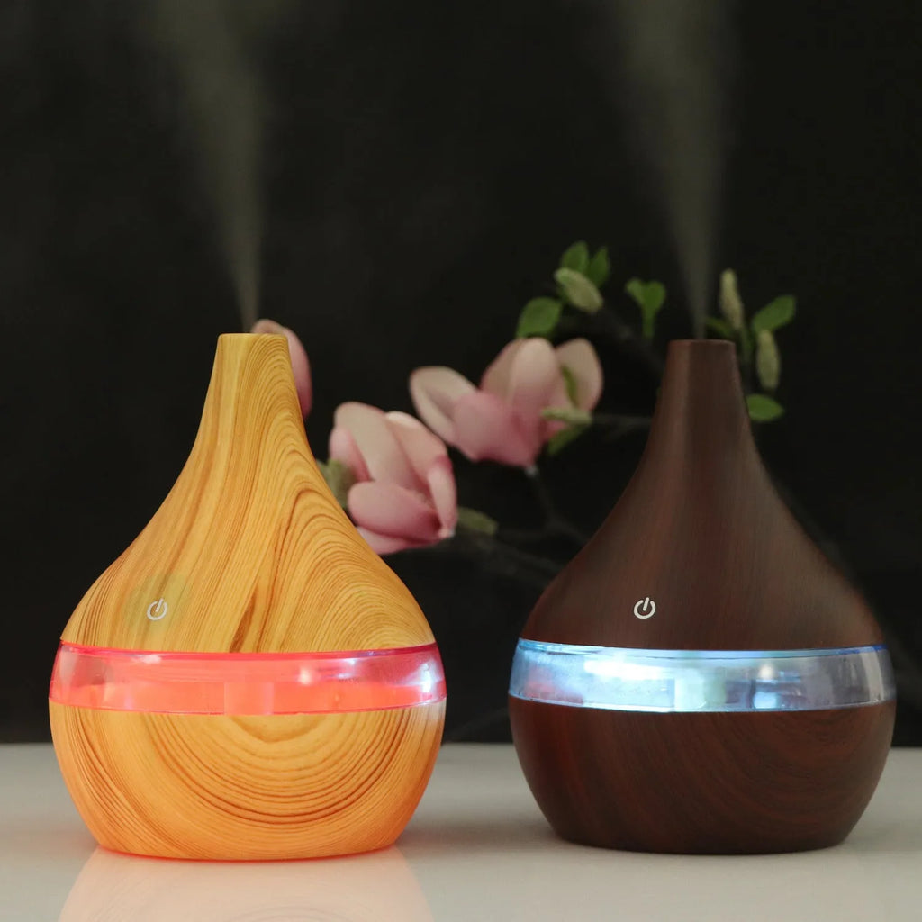 USB-powered mini air purifier humidifier in a wood grain columnar design for small rooms.