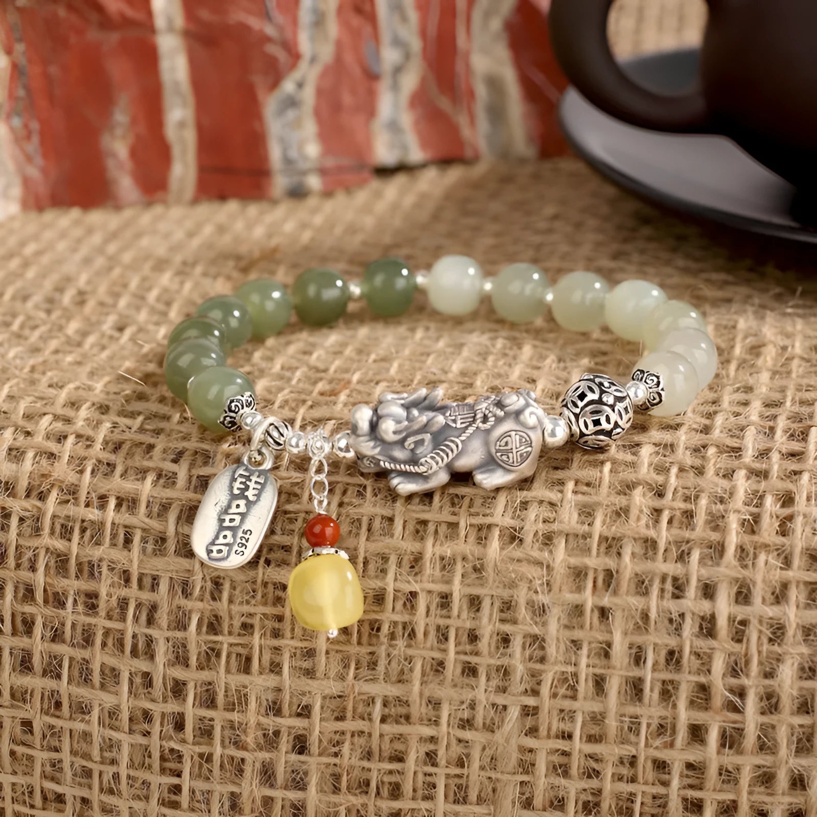 Retro women's bracelet with pure silver coin charm and natural Hetian jade bead
