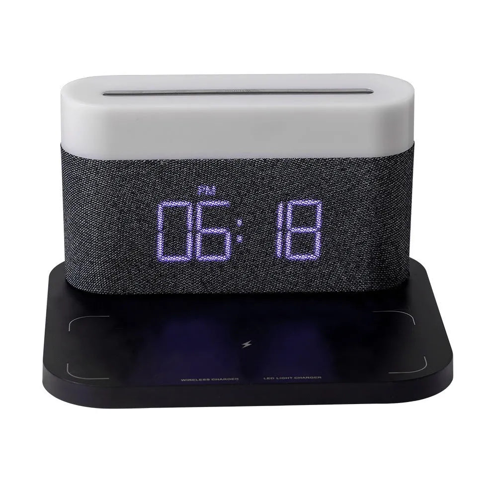 Black or white table lamp with integrated wireless phone charger, LED clock display, and nightlight functions