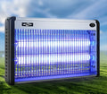 White or black electric mosquito killer lamp with UV light tubes on a tabletop or mounted on a wall.