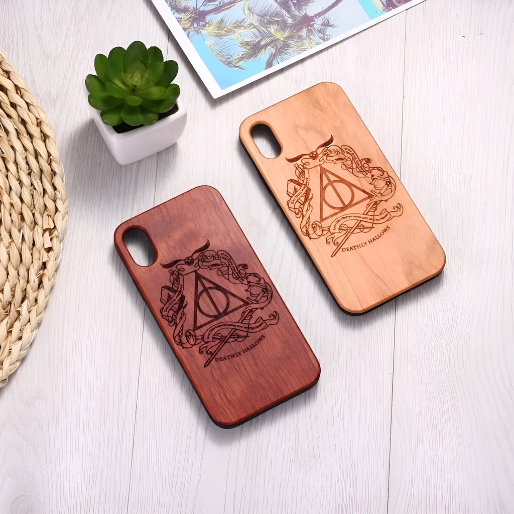 Wooden phone case with TPU bumper showing laser-carved pattern on wooden back