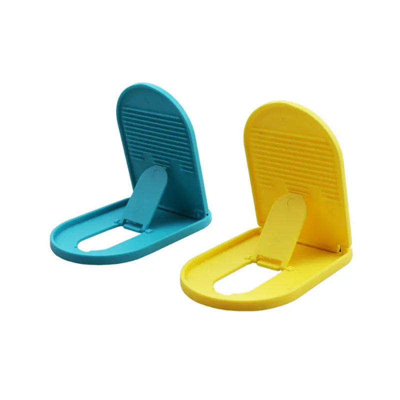 Plastic lazy bracket mobile phone stand in multiple colour options on desk