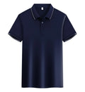 Man wearing a loose fit apricot coloured short sleeve cotton blend polo shirt.