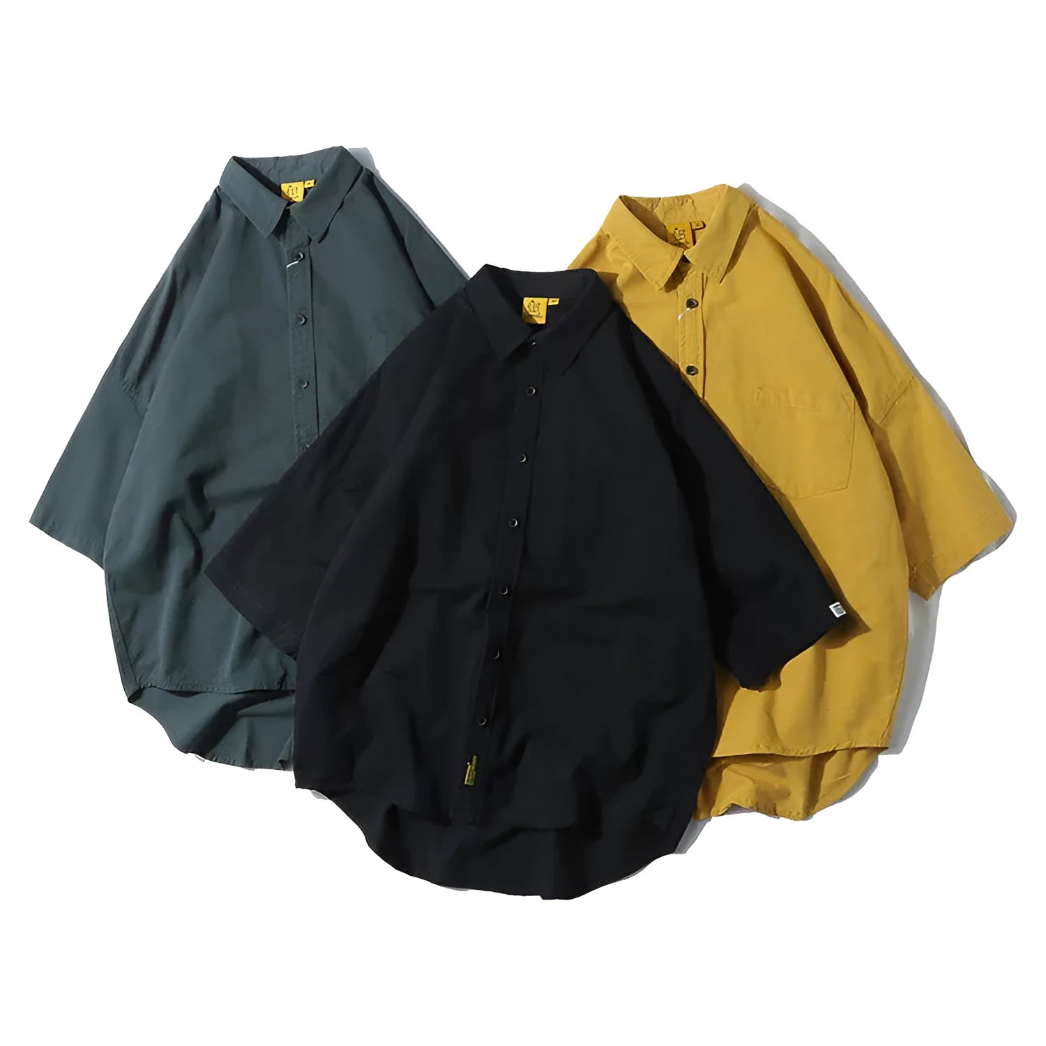 Men's loose fitting pure colour cotton cardigan shirt on a hanger, showing short sleeve and long sleeve style options.