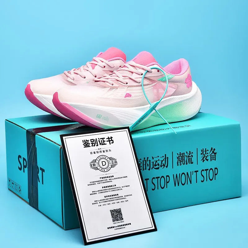 Low top carbon plate racing sneaker in Glacier colour with PU mesh upper and natural rubber sole.