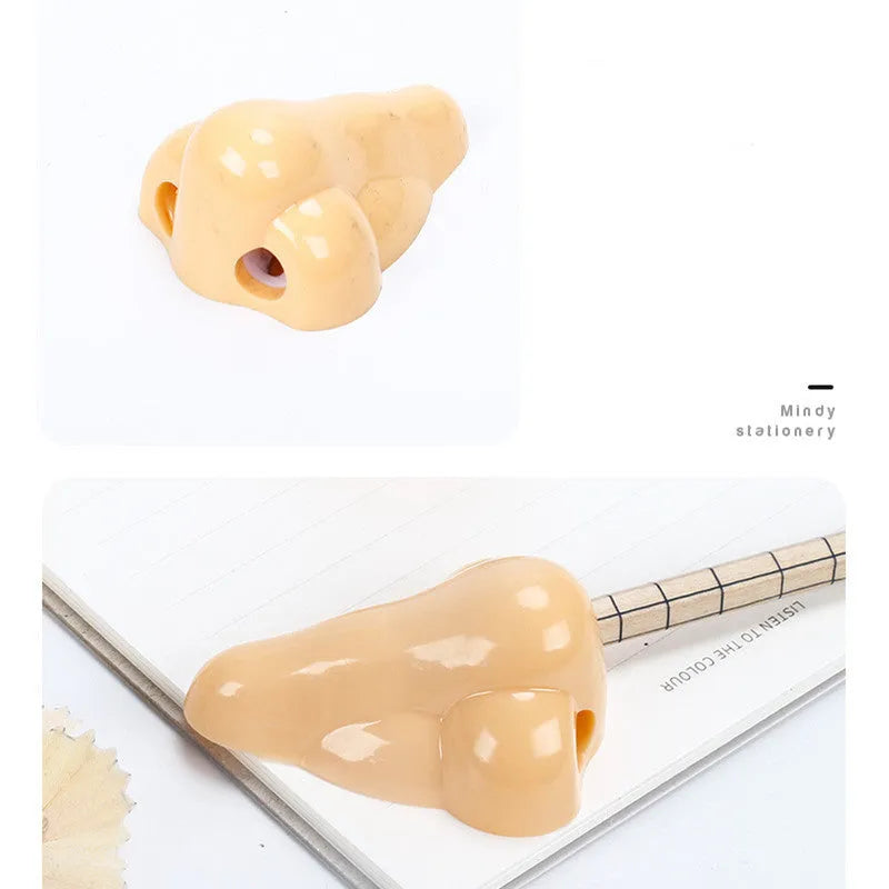 Flesh colour plastic manual pencil sharpener with geometry shape measuring 58x45x30mm