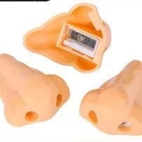 Flesh colour plastic manual pencil sharpener with geometry shape measuring 58x45x30mm