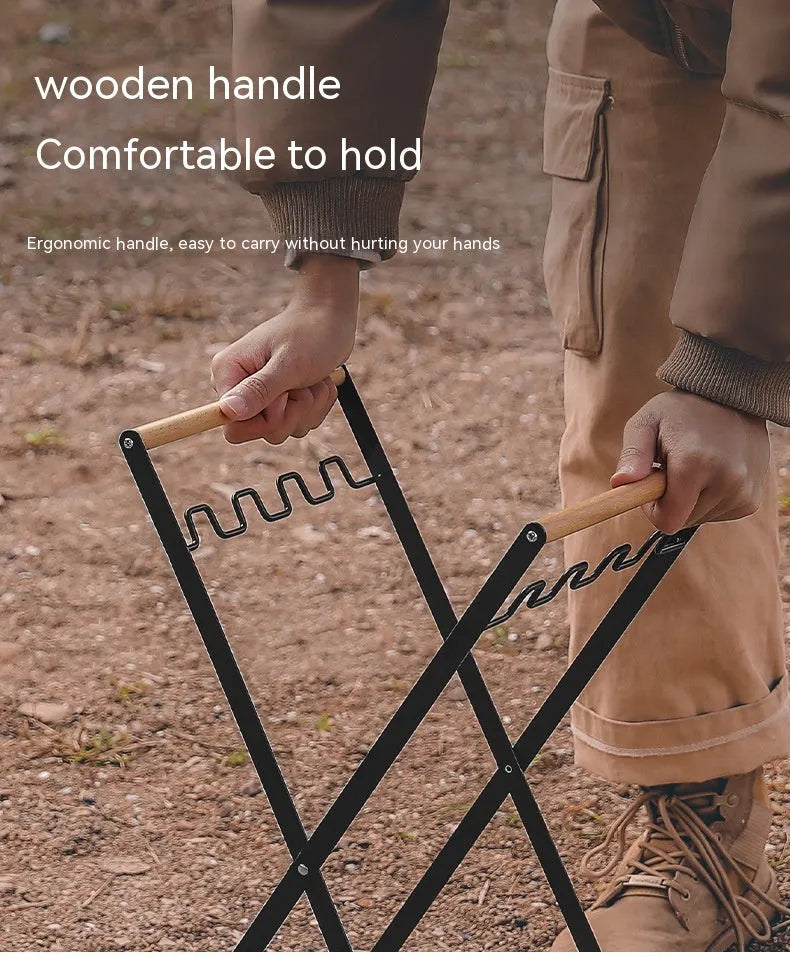 Folding outdoor rubbish rack with iron frame and wooden handle, shown in black colour.