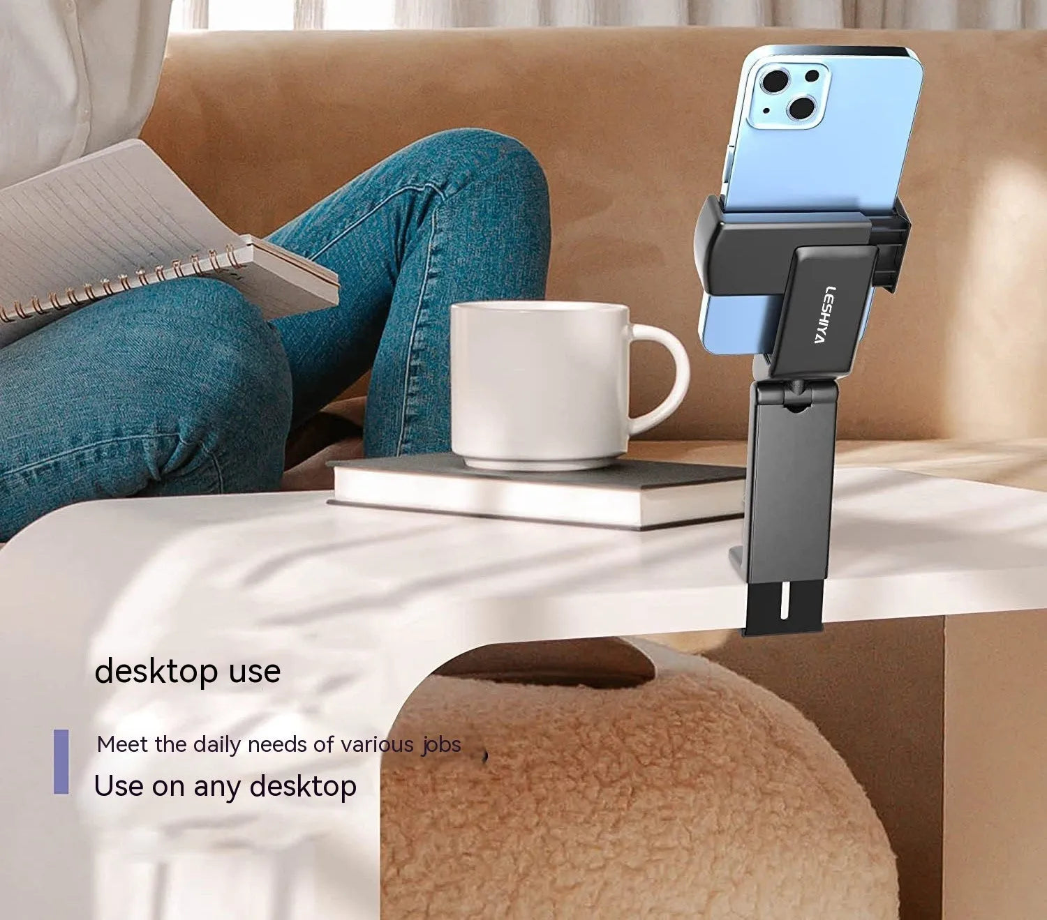 Universal foldable rotating phone holder in black, grey, or green colour on a flat surface, showing its adjustable arm.