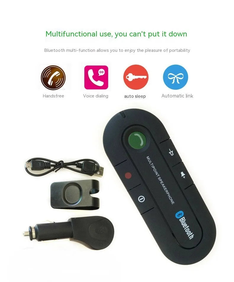 Black vehicle-mounted Bluetooth handsfree device clipped to car sun visor with aux cable
