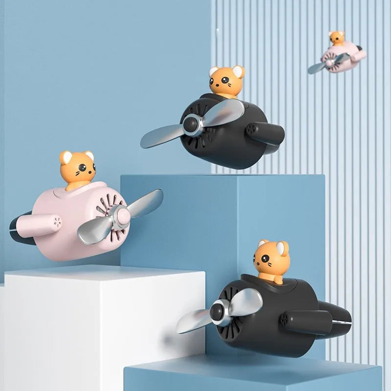 Cartoon aeroplane-shaped plastic clip for car air vent with fragrance pads