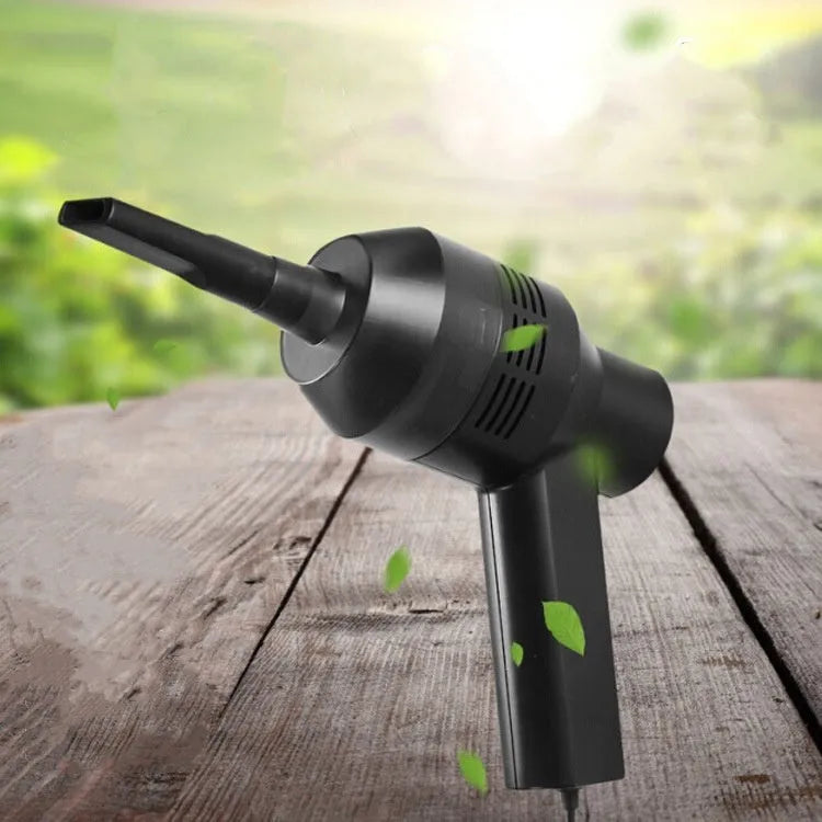 Black handheld desktop mini vacuum cleaner for cleaning keyboards and cars.