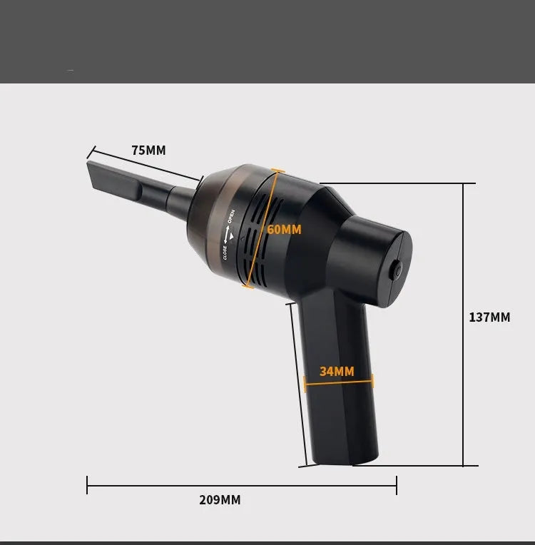 Black handheld desktop mini vacuum cleaner for cleaning keyboards and cars.