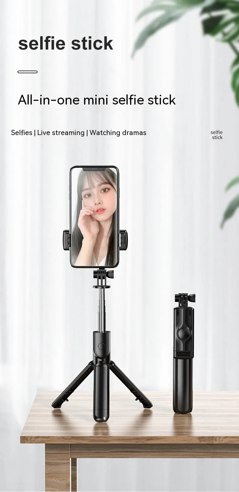 Black selfie stick tripod with wireless Bluetooth remote and universal phone holder, anti-shake floor stand.