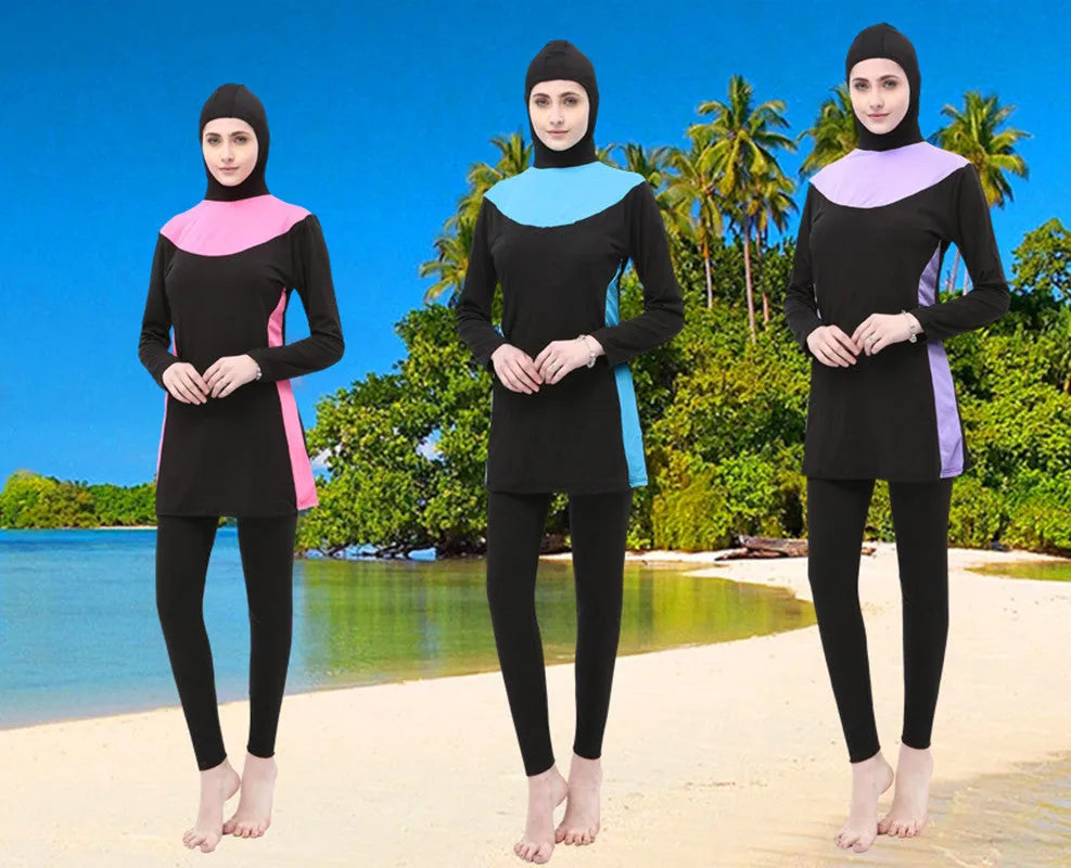 Women's black hooded swimsuit with long sleeves and matching pants for swimming
