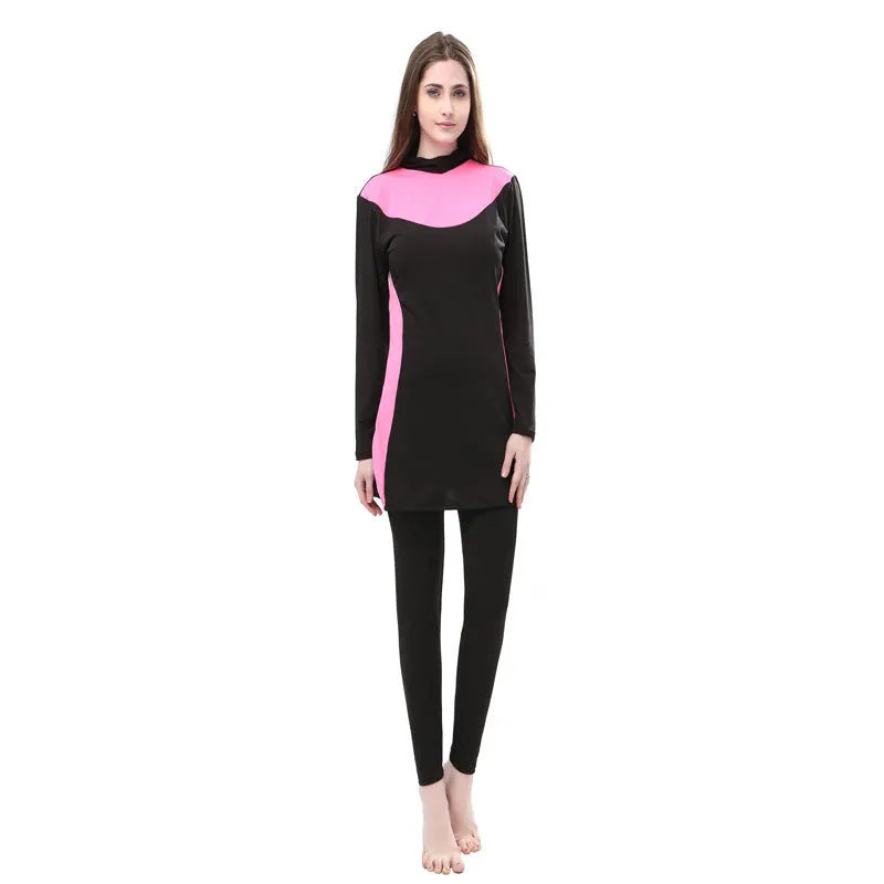 Women's black hooded swimsuit with long sleeves and matching pants for swimming