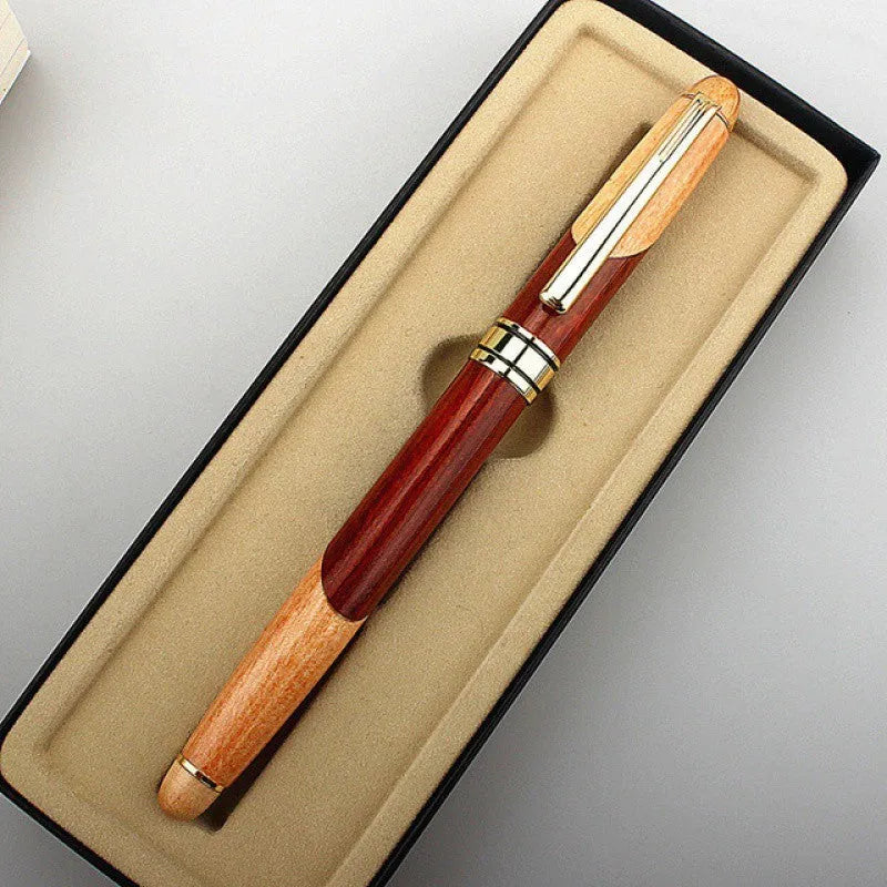 Wooden fountain pen with metal details alongside a matching fabric pen bag