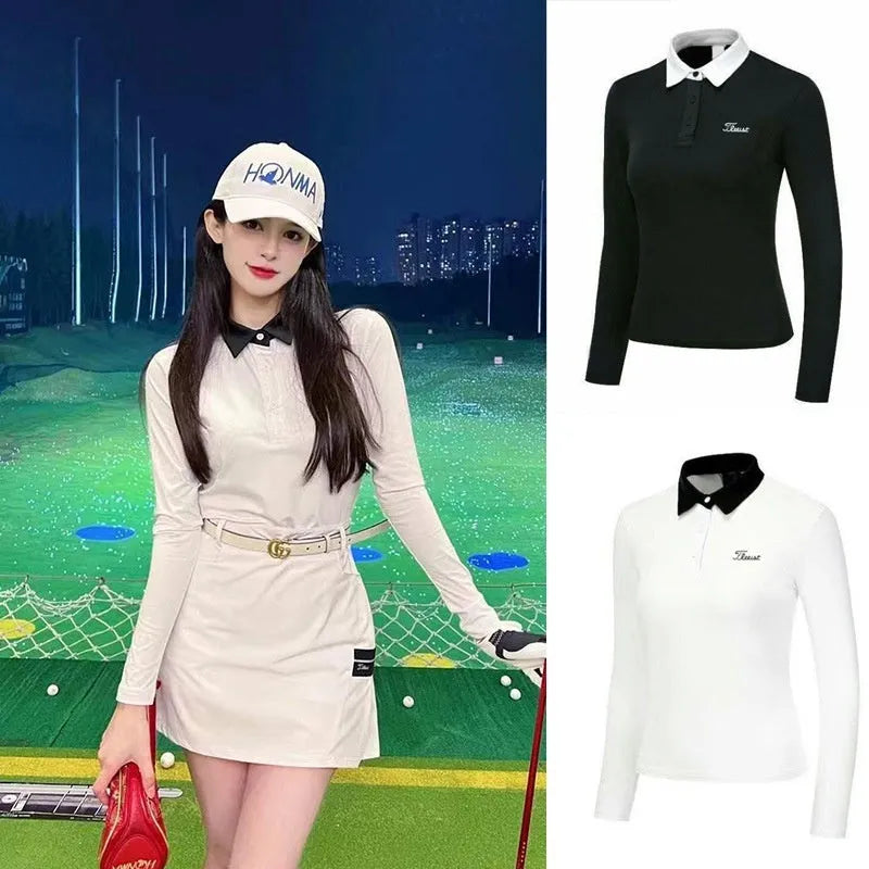 Women's white slim fit long sleeve polyester golf top on a hanger.