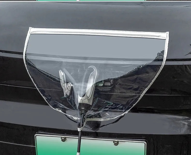 Black waterproof PVC rain cover for electric vehicle charging gun, shown with magnetic strips.