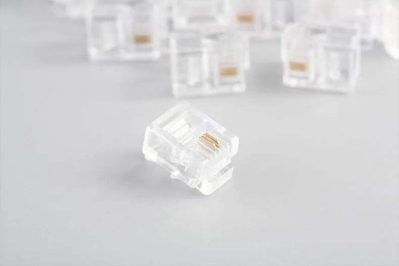 White Cat 6 RJ45 crystal head 100-piece can with gold-plated contacts and shielded jack options