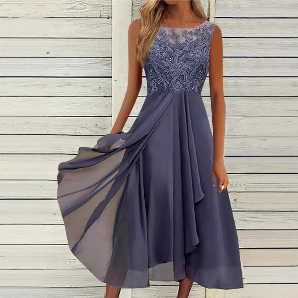 Women's sleeveless green chiffon dress with lace embroidery and a mid-length flowy skirt.
