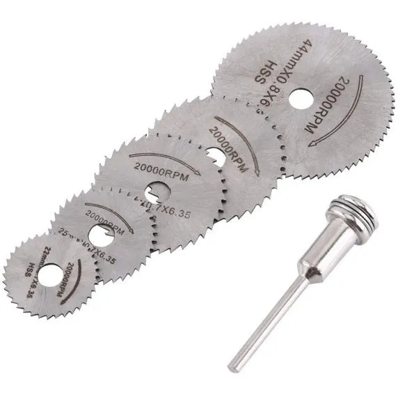 Six circular saw blades with mandrel on dark background showing blade teeth and centre holes