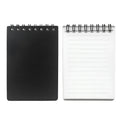 Spiral-bound business notepad with transparent cover and included pen