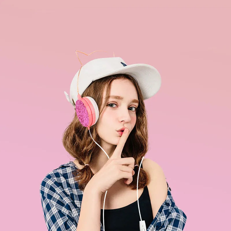 Wired over-ear headphones in black with 30mm driver, built-in microphone, and 1.2m PVC cable