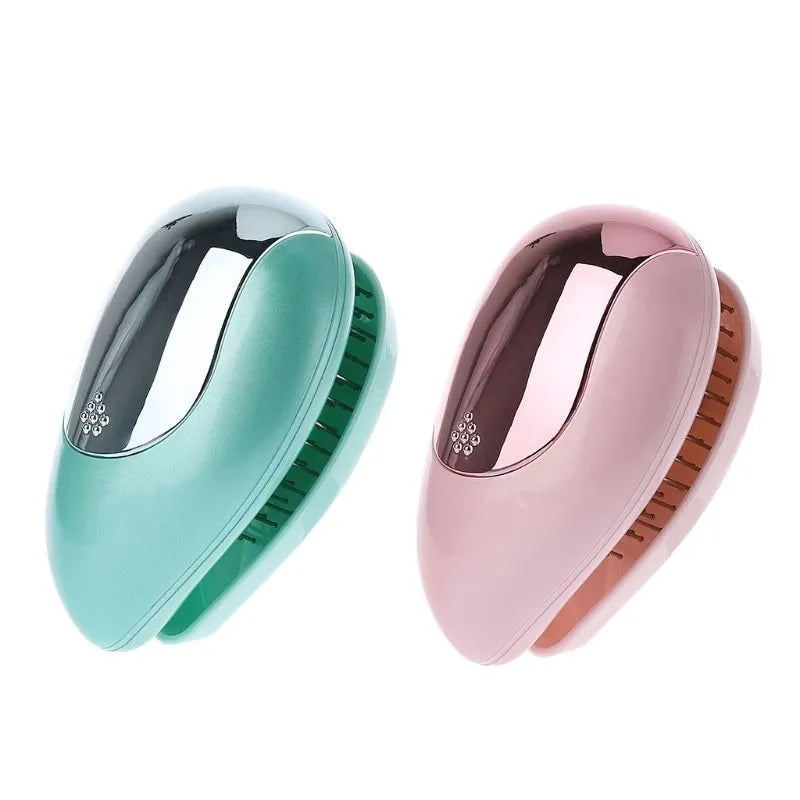 Pink electric ionic hair comb with ergonomic design on white background