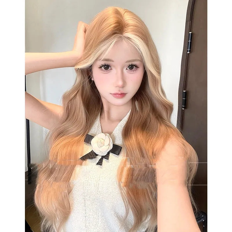 Long curly lace front wig in American highlight gold colour on display stand