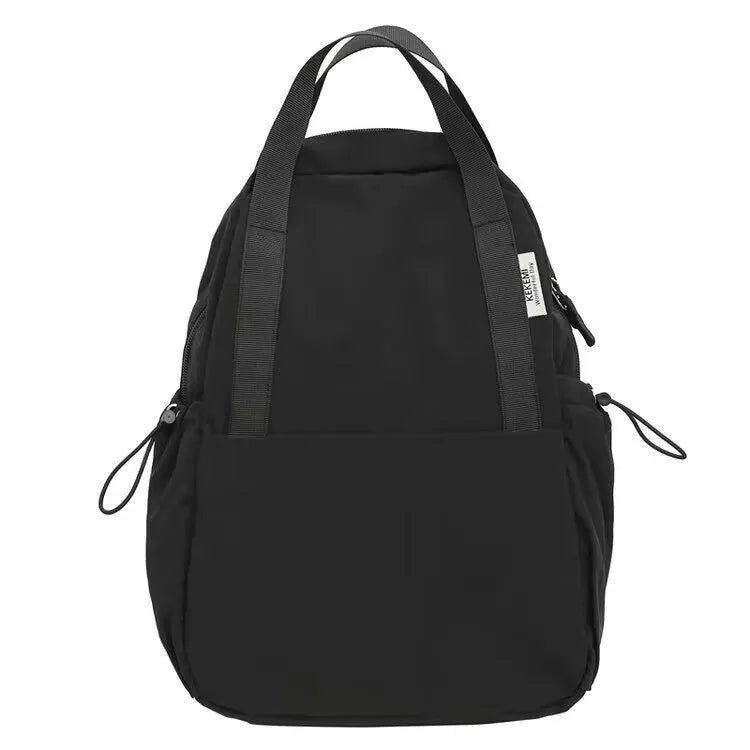 Solid colour nylon backpack with curved shoulder straps and lock details in multiple colour options