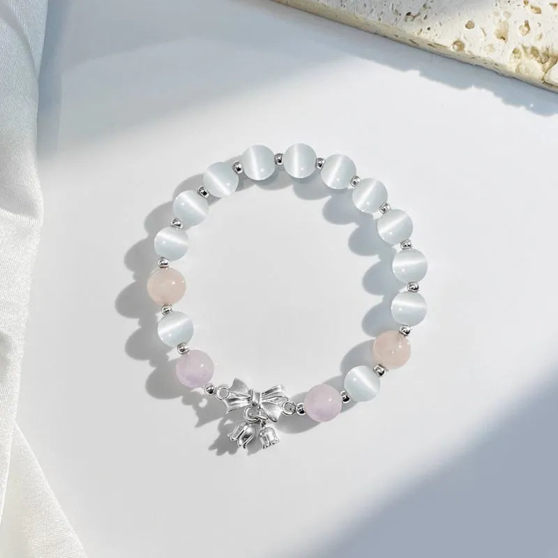 Lavender purple bowknot opal crystal bracelet with electroplated finish for women.