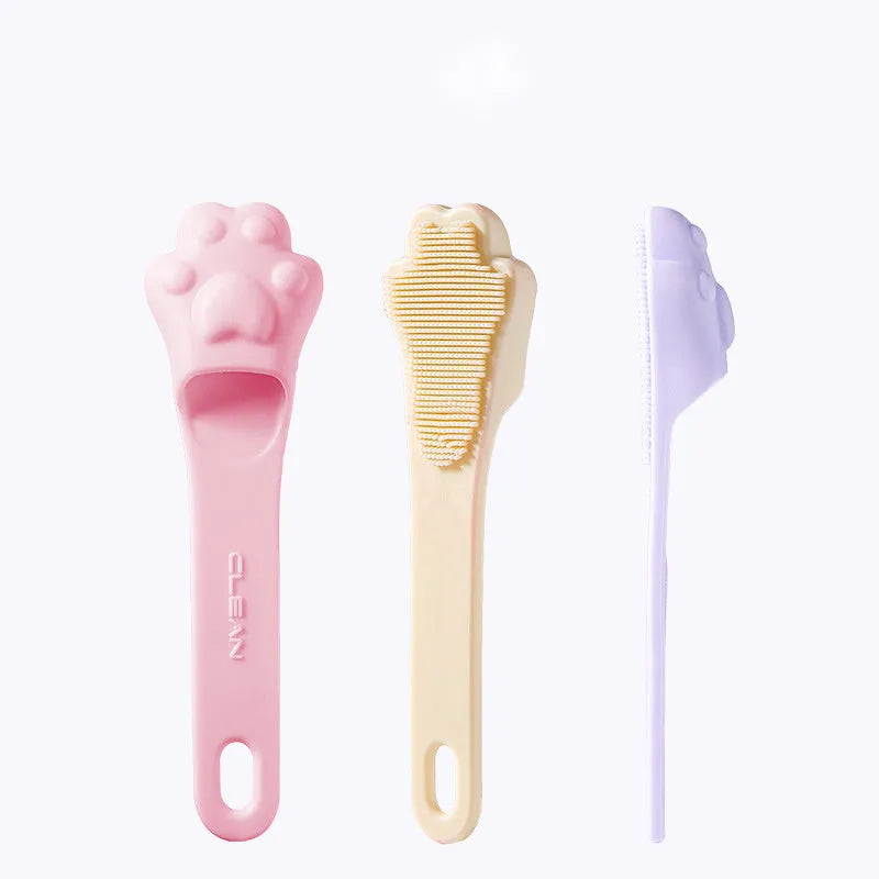 Pink silicone finger toothbrush for dogs and cats with soft nubby bristles.