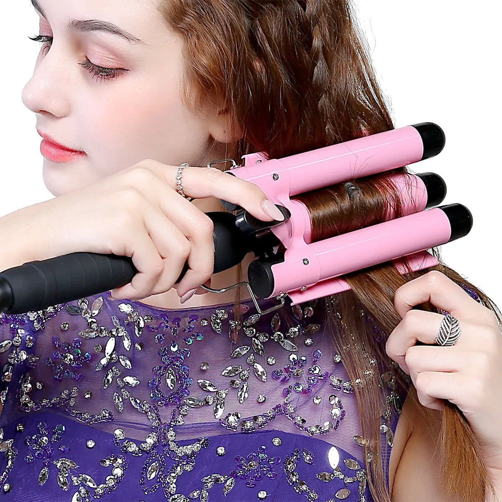 Pink curling iron with LCD screen, conical ceramic barrel 16-20mm, and rotating cord