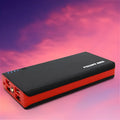 A red 20,000mAh portable power bank with USB port, showing its compact size.