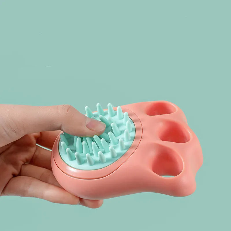 Silicone pet bath brush for cats and dogs measuring 12cm with soft bristles