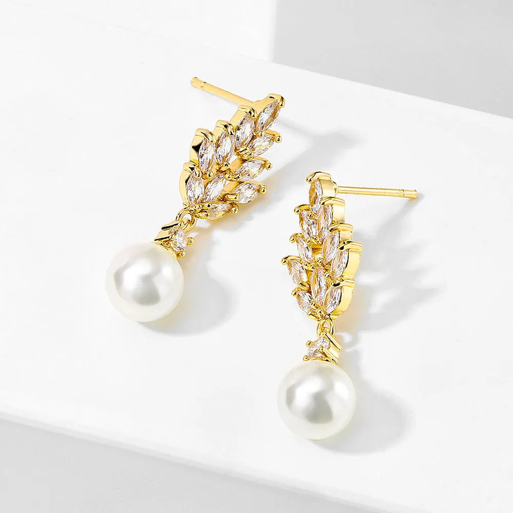 Geometric flower design earrings with micro inlaid zircon and pearl accents in gold, platinum, and rose gold plating.