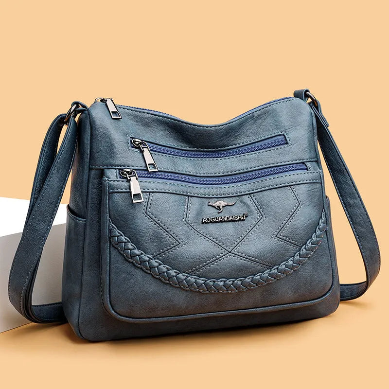 Soft PU leather women's shoulder bag in blue colour with crossbody strap